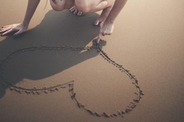 Vacanza - cuore sulla sabbia